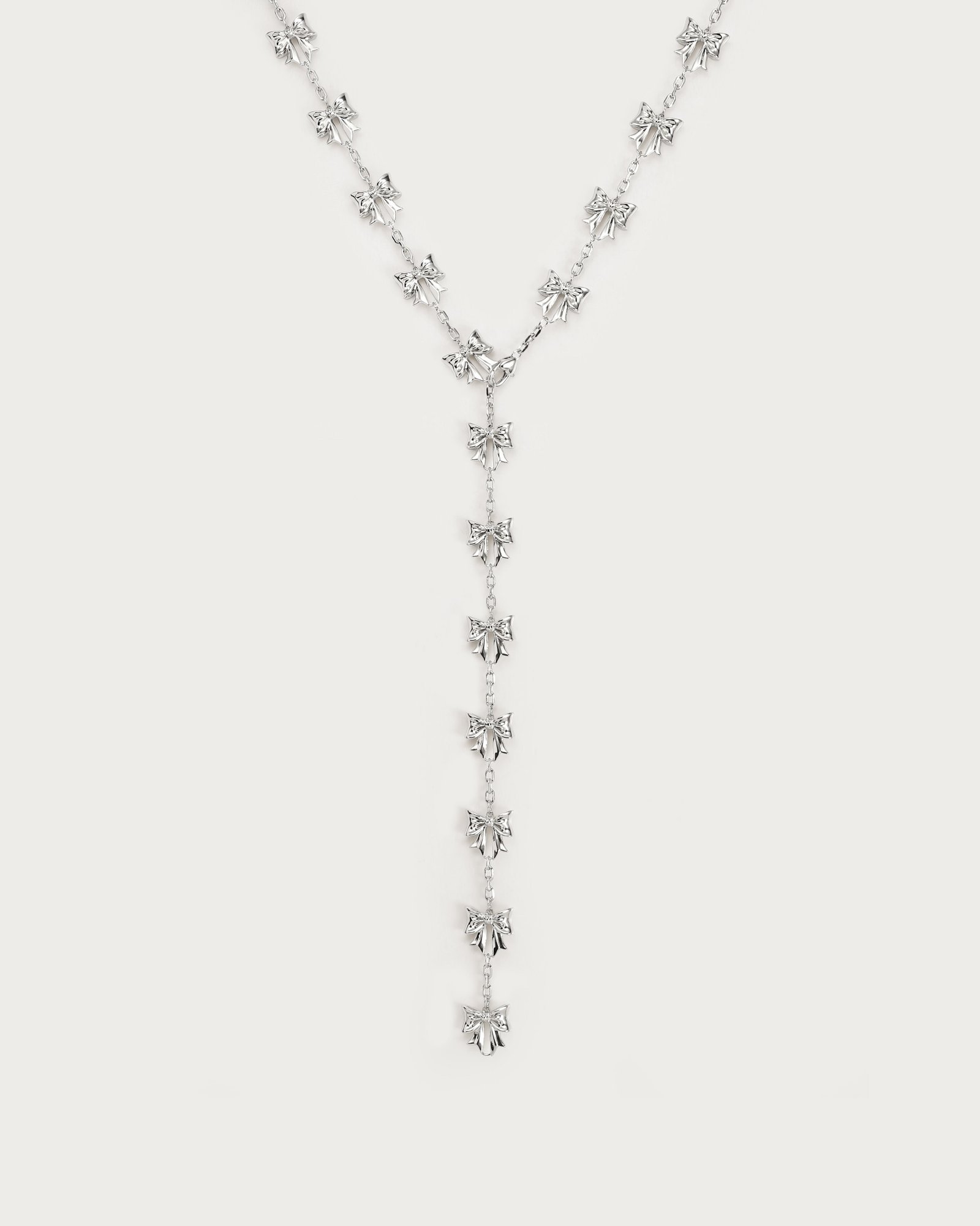Bow Lariat Long Necklace in Silver